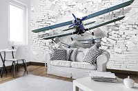 Флизелиновые фотообои в детскую мальчика 416x254 см Самолет вылетает из 3Д кирпичной стены (10407VEXXXL)+клей