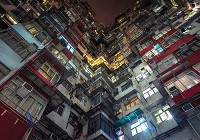 Флізелінові фотошпалери вікна в місто 254x184 см 3D Вид знизу на багатоповерхівку (12669V4)+клей - вид 1 мініатюра